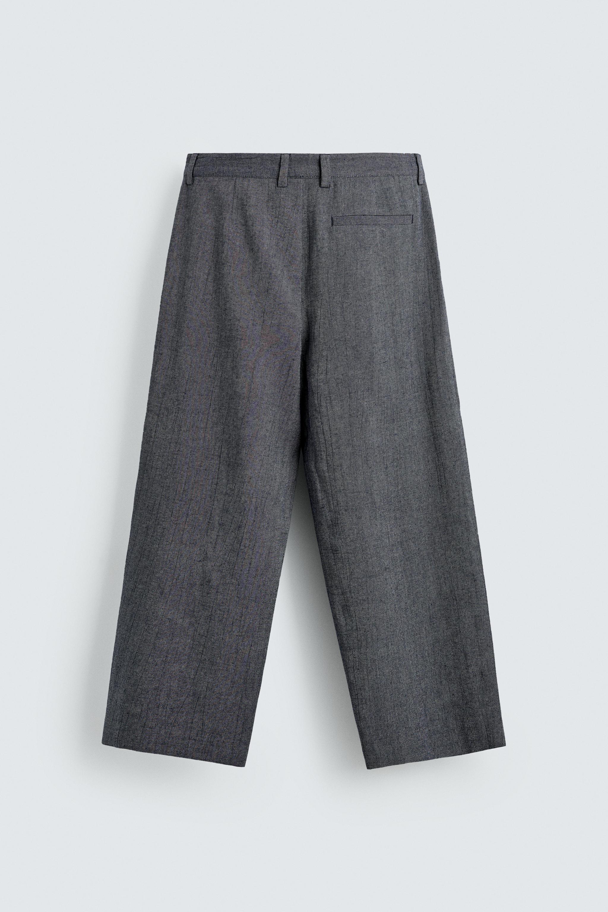 PLEATED RELAXED FIT PANTS